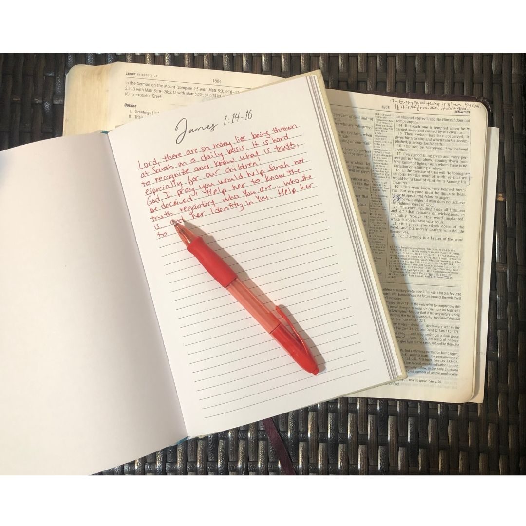 prayer journal and open bible
