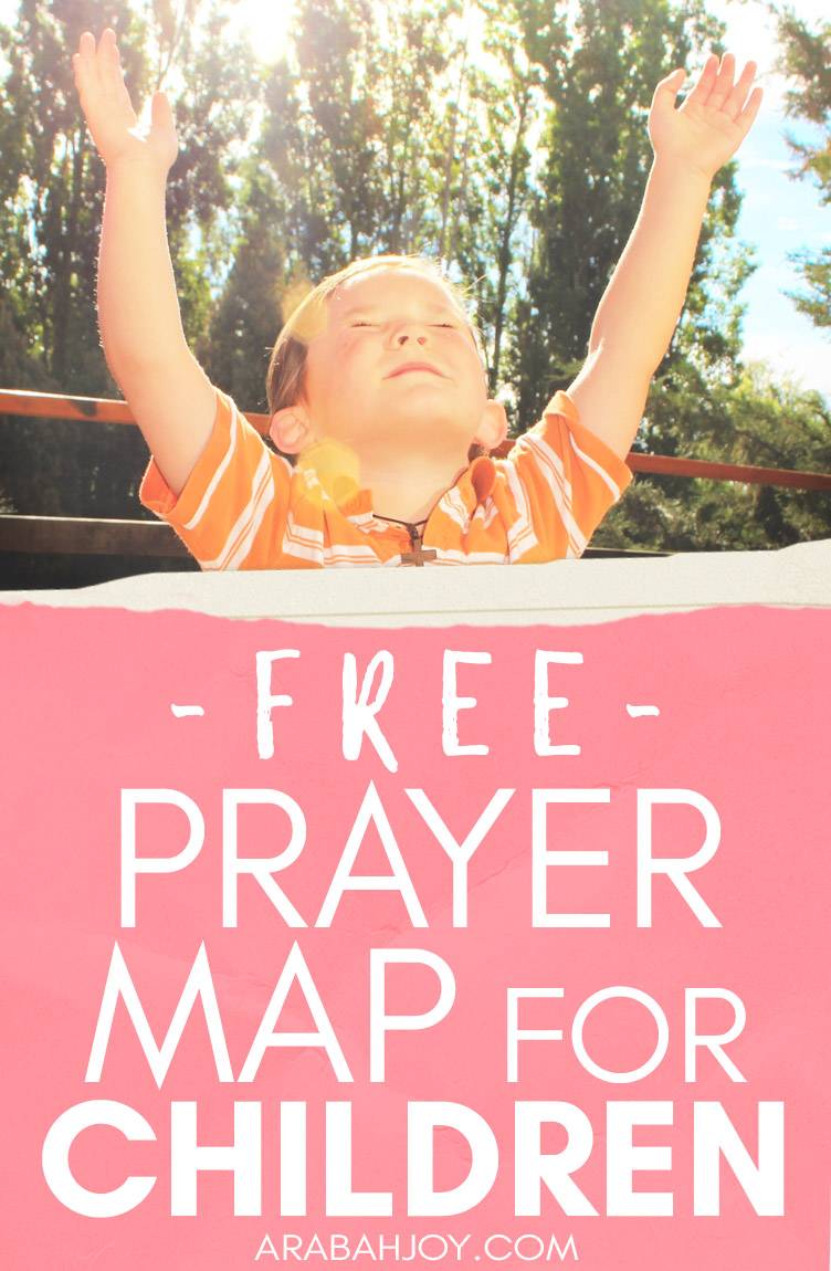 Child lifting hands in prayer